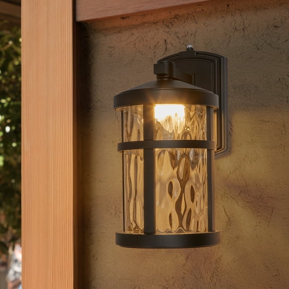 Maxxima LED Outdoor Wall Light, Black Finish, Clear Hammered Glass, Dusk to Dawn Sensor, 750 Lumens, 3000K Warm White