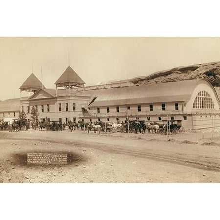 Hot Springs SD Exterior view of largest plunge bath house in US on FE and MV Railway Large building with several horses and carriages in front Poster Print by John CH