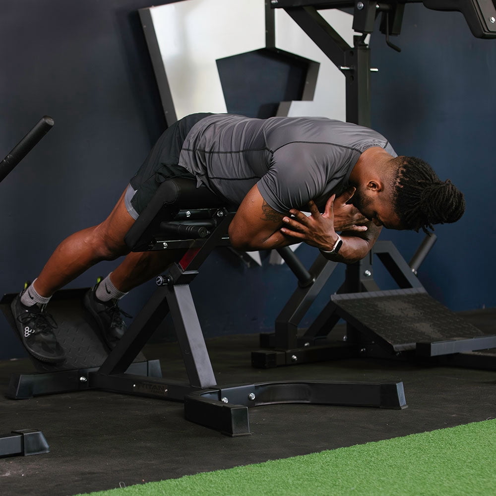 Titan Fitness Roman Chair Back Extension Machine, Adjustable Hyperextension Bench, Soft Durable Padding, Non-Slip Footplate, Adjustable Height, Exercise Equipment for Core, Back, Hamstrings, Glutes