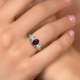 thumbnail image 4 of Gem Stone King 18K Yellow Gold Plated Silver Red Rhodolite Garnet and Blue Zircon Filigree Style 3 Stone Ring for Women (2.65 Cttw, Oval 8X6MM and 6X4MM) (Size 7), 4 of 6