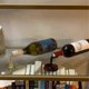 thumbnail image 4 of Mini Wine Bottle Stand Red Gold Individuality Acrylic Spilled Holder Desktop Rack Ornament, 4 of 5