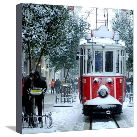 Close up Shot of Tramway Covered with Snow in Istanbul Stretched Canvas Print Wall Art By