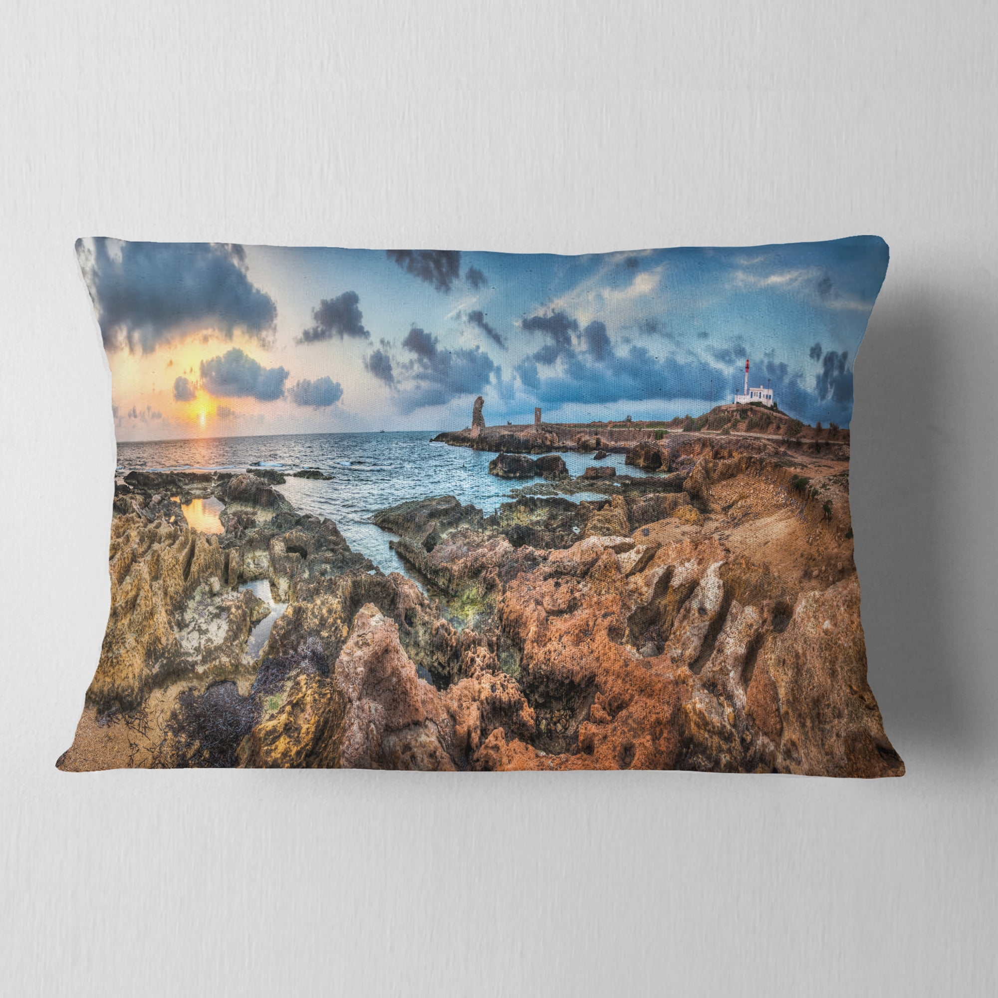 Designart Blue Sky over Rough Rocky Coast - Seashore Throw Pillow - 12x20