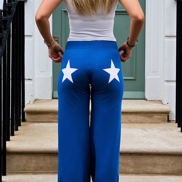 Ropa europea y americana 2024 Verano Nuevo estilo Color contrastante Alto elástico Deportes Bordado Estrella Estampado Pantalones rectos casuales para mujeres