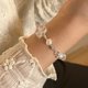 thumbnail image 1 of Pulsera de cristal Pulsera de niña Pulsera de perla de ojo de gato Pulsera de dopamina Niche Sense Joyas que no se decoloran, 1 of 5