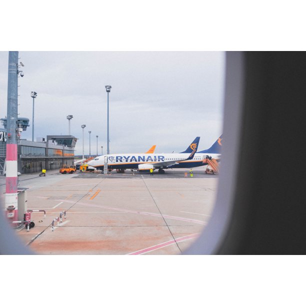 Ryanair Airliner On Airport12 Inch BY 18 Inch Laminated Poster With