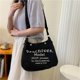 thumbnail image 4 of Bolso de mano portátil de gran capacidad para primavera y verano, bolso de lona coreano para mujer, bolso para debajo del brazo, bolso de hombro con texto, 4 of 6