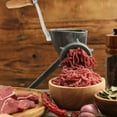 thumbnail image 2 of Picadora de carne manual con mango de acero inoxidable para uso doméstico, ideal para embutidos y procesamiento de alimentos. Herramienta resistente para picar carne., 2 of 7