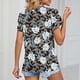thumbnail image 4 of Blusa de encaje de guipur con escote en V XXL y mangas de pétalos con flores blancas sobre fondo negro, perfecta para una cita, 4 of 6
