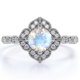 thumbnail image 1 of JeenMata Anillo de Bodas de 1,75 Quilates con Piedra Lunar Arcoíris Facetada Redonda y Detalle de Moissanita en Oro Blanco de 18 K sobre Plata, 1 of 6