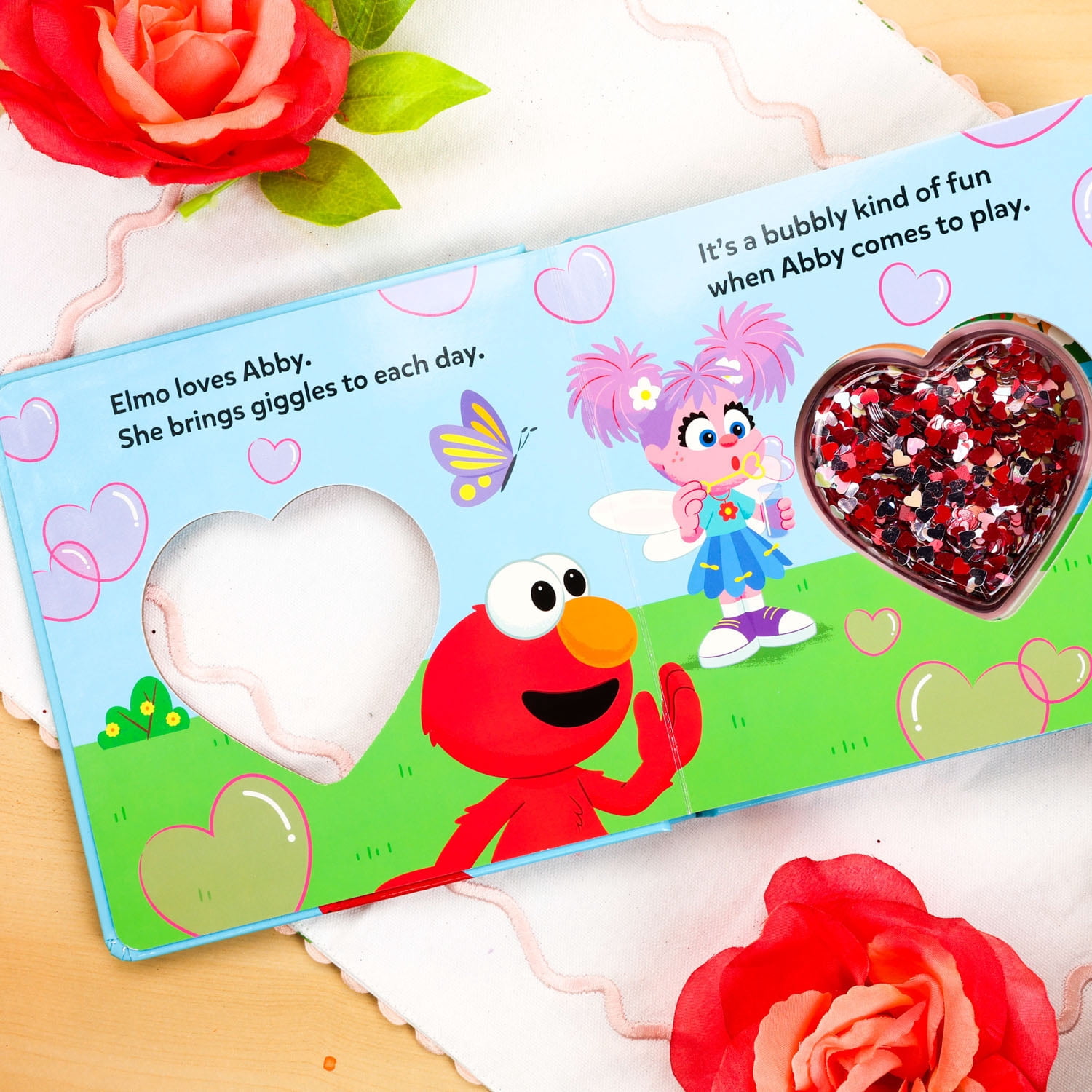 Sesame Street: Elmo Loves His Friends! (Board Book)