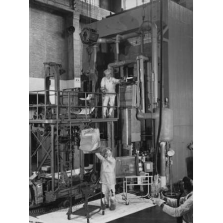 - USA Tennessee Oak Ridge Oak Ridge National Laboratory three scientists working in nuclear laboratory Canvas Art - (24 x 36)