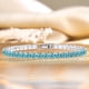 thumbnail image 2 of JeenMata 11 TCW Diciembre de corte redondo - Topacio azul - Pulsera de tenis con piedra natal para mujer en diseño de eternidad - Chapado en oro blanco, Mujer, Adulto, 2 of 6