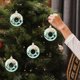 thumbnail image 5 of Adorno Navideño de Plástico para La Punta Del Árbol: Estrella Verde de 8X7 Cm con Forma de Rosquilla, Caramelo o Bagel | Paquete de 4 Adornos Colgantes para Las Fiestas, 5 of 6