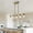 Golden, variant on ACE-LIGHTS,Modern Industrial 5-Light Chandelier with Clear Glass Shades(Bulbs Not Included),Hanging Ceiling Light Fixture for Living Room,Dining Room,Kitchen Island(Black)