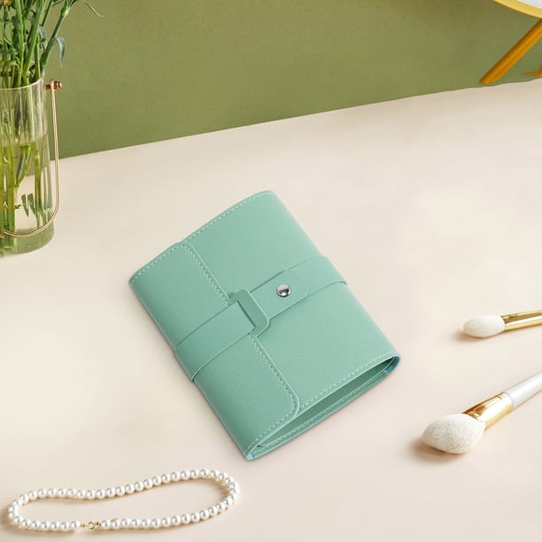 Xihbxyly Organizador de Pendientes, Elegante Estuche Portátil, Estuche de Viaje Compacto, Diseño de Cuero Sintético Duradero, Protege Las Joyas de Daños, Ideal para Uso Doméstico o En Movimiento, Reg