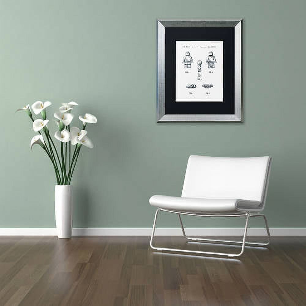 Trademark Fine Art "Lego Man Patent 1979 Page 1 White" Canvas Art by Claire Doherty, Black Matte, Silver Frame