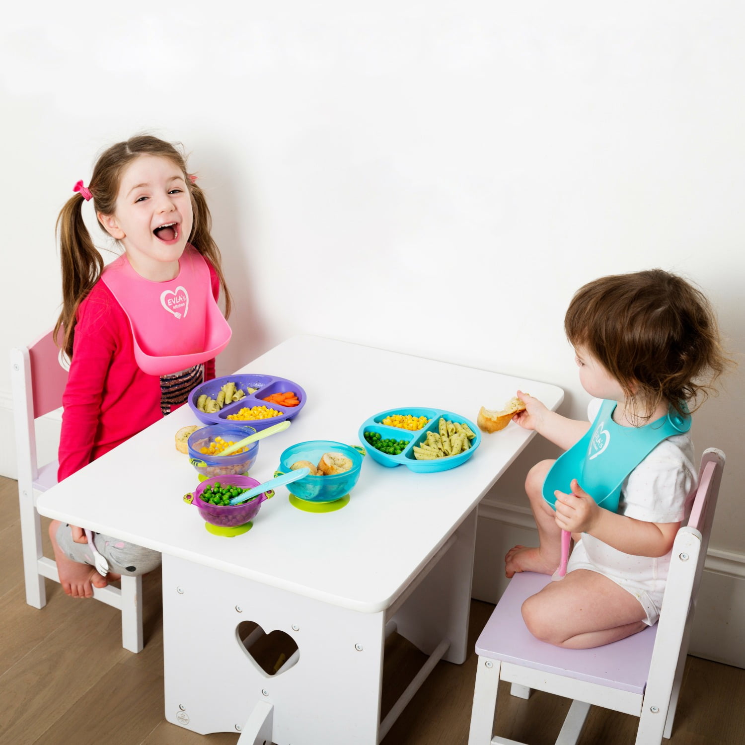 EVLA’s 9-Piece Silicone Toddler Plates and Bowls Set with Airtight Lids