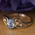 thumbnail image 6 of 10k Yellow Gold Oval Blue Topaz And Diamond Ring, 6 of 8