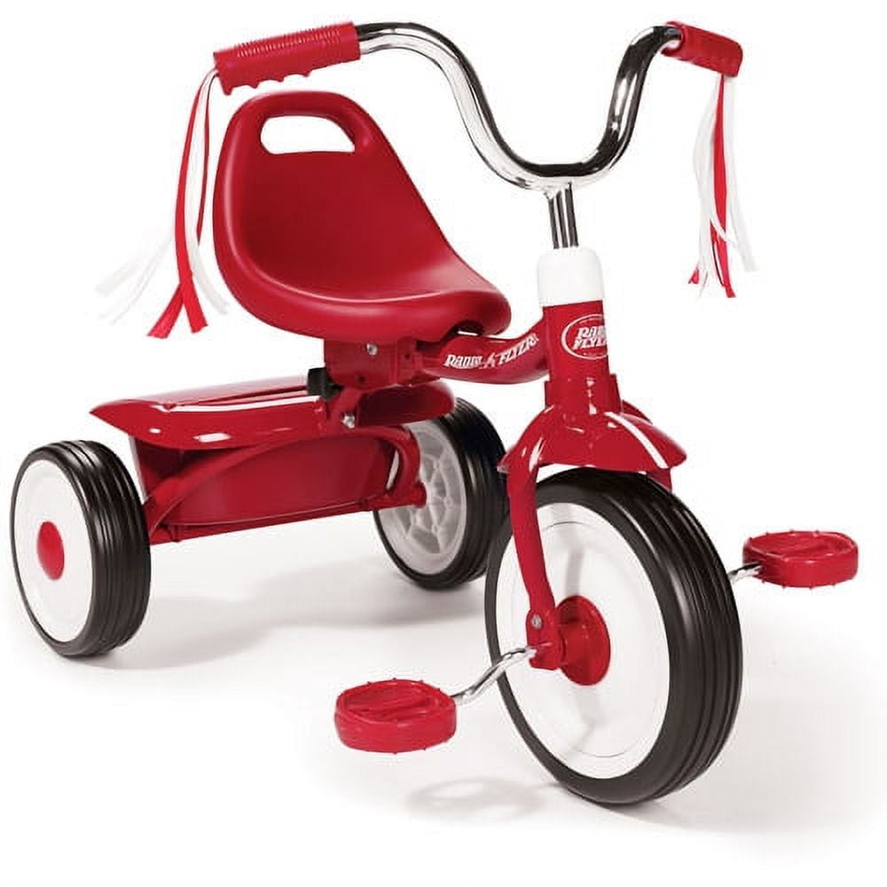 A red toddler trike with streamers