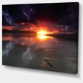 thumbnail image 2 of Mirrored Sun dans Nuageux Bord de Mer Foncé, 2 of 3