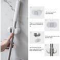 thumbnail image 4 of Soporte para escoba montado en la pared, soporte para fregona/escoba de pared, organizador de suministros de limpieza autoadhesivo resistente, 3 uds., 4 of 5