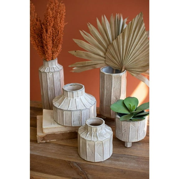 SET OF FIVE WHITE CERAMIC PLANTERS