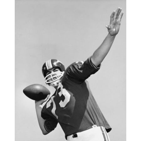 Football player throwing a football Stretched Canvas -  (18 x