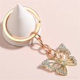 thumbnail image 2 of LLavero de mariposa hueca de diamantes de imitación para mujer, llaveros de cristal chapados en oro, llaveros de insectos, regalos de fiesta, joyería de moda, 2 of 4