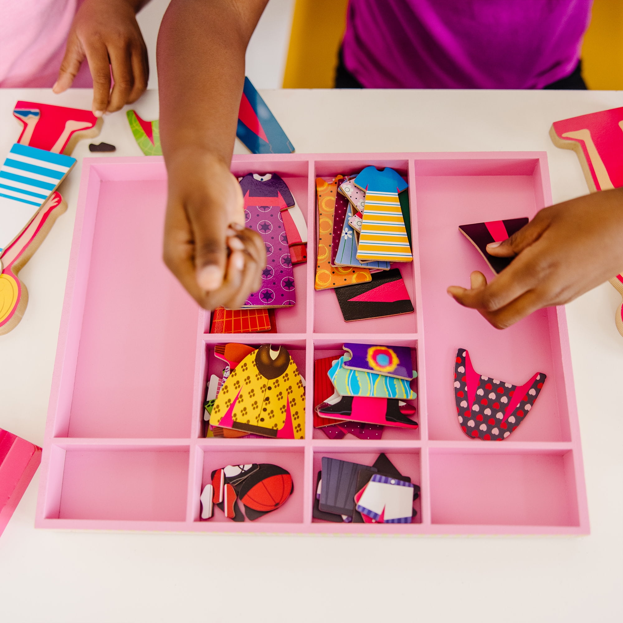 Melissa & Doug Abby and Emma Deluxe Magnetic Wooden Dress-Up Dolls Play Set (55+ pcs)