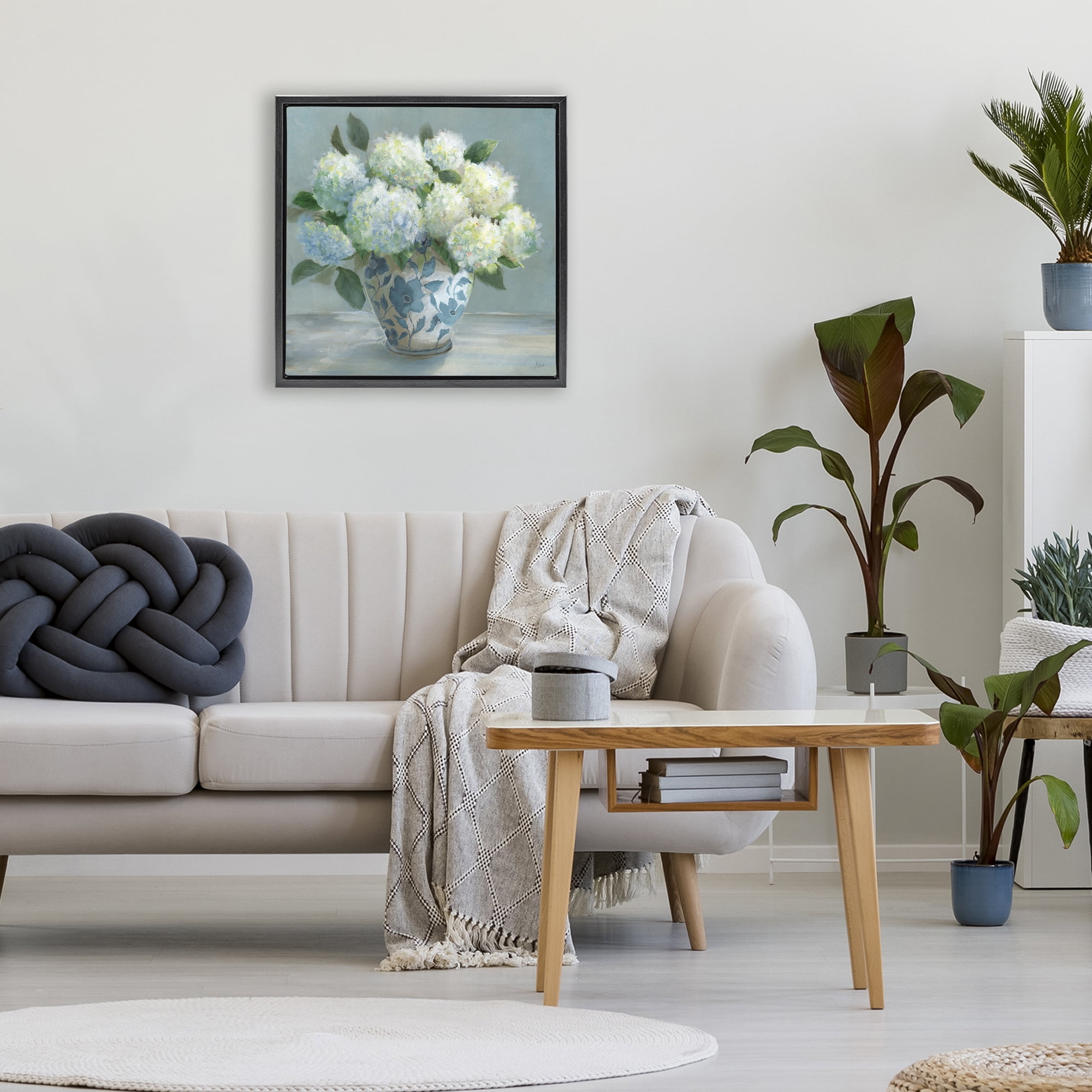 Stupell Industries Hydrangeas in Elegant Vase Black Framed Floater Canvas Wall Art, design by Nan