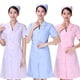 thumbnail image 4 of Rosa Uniforme de manga corta Esteticista Enfermería Abrigo blanco Algodón Ropa de hospital Ropa Cuello en V Traje de trabajo Traje de moda Abrigo de farmacia sin sombrero y pantalón - Talla M, 4 of 5