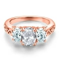 thumbnail image 3 of Gem Stone King 18K Rose Gold Plated Silver White Topaz and Sky Blue Aquamarine Filigree Style 3 Stone Ring for Women (2.50 Cttw, Oval 8X6MM and 6X4MM) (Size 8), 3 of 6