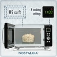 thumbnail image 2 of Nostalgia 0.9 cu ft Mid-Century Retro Microwave Oven, 900W Microwave Oven with Digital Clock, Black, 2 of 6