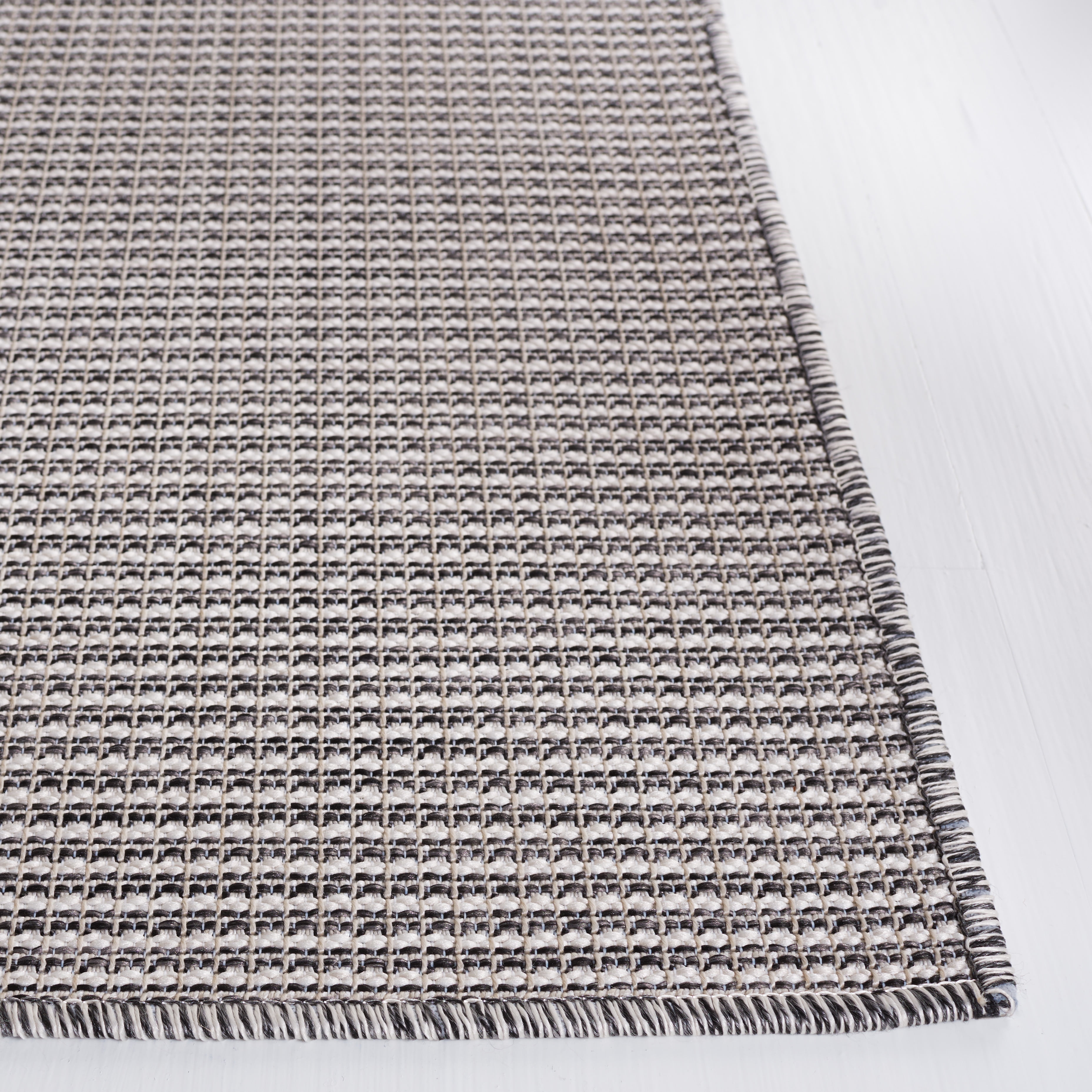 SAFAVIEH Martha Stewart Hampton Solid Indoor/Outdoor Area Rug, Beige/Black, 4' x 6'