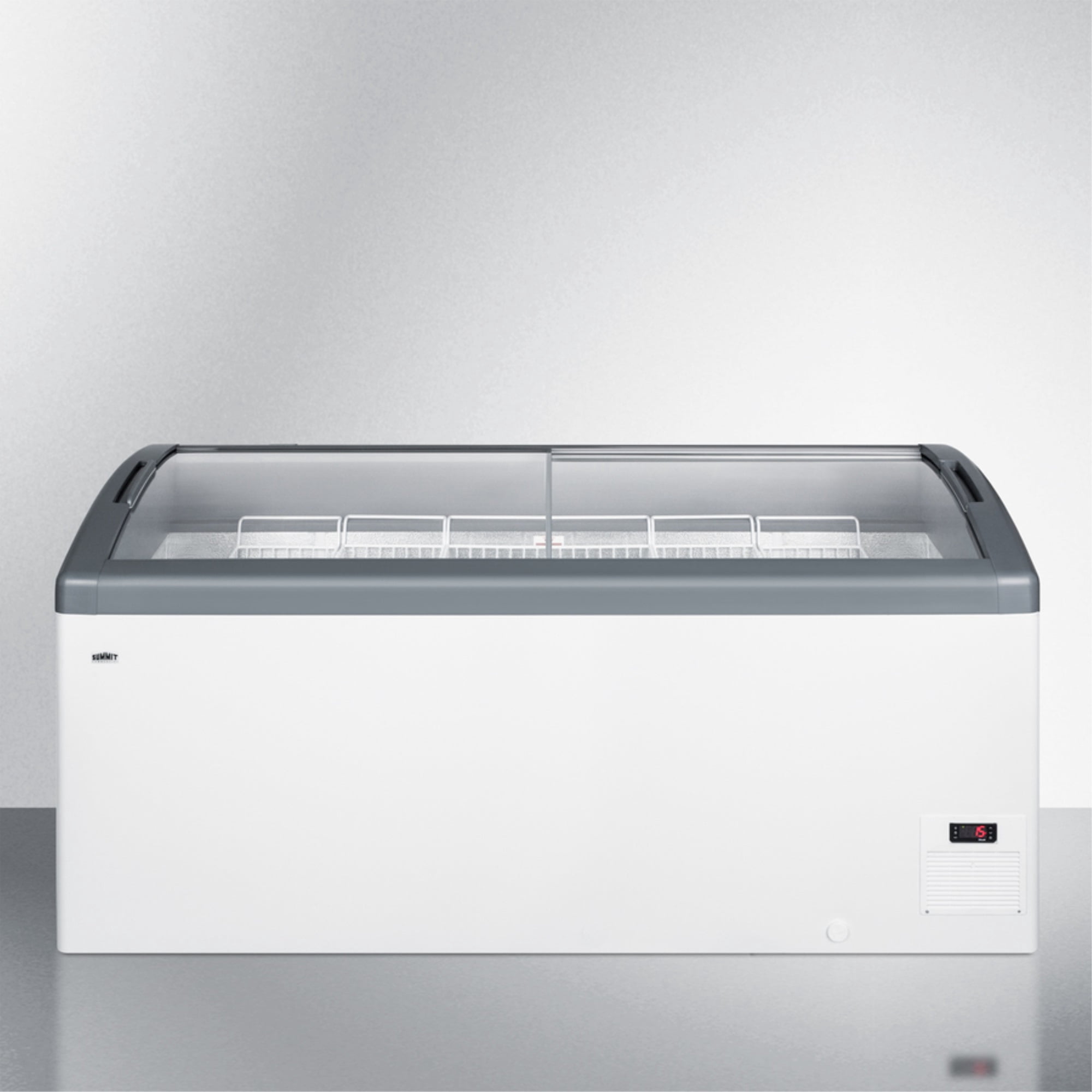 Curved top commercial ice cream freezer made in Denmark, with sliding glass lid, digital thermostat, novelty baskets, and 17.1 cu.ft. interior