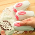 thumbnail image 2 of Nueva mini máquina selladora portátil de bolsas de embalaje por calor para cocina Blanco y rosa, 2 of 9