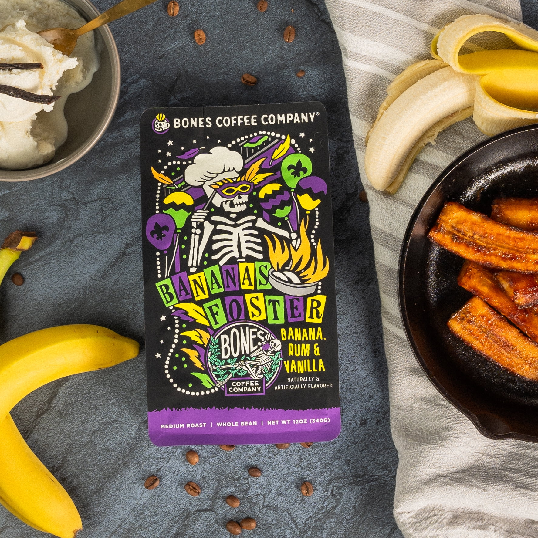 Bones Coffee Company Bananas Foster Whole Coffee Beans Banana Rum & Vanilla Flavor, Low Acid Flavored Coffee, Made with Arabica Coffee Beans, Medium Roast Gourmet Coffee (12 oz)