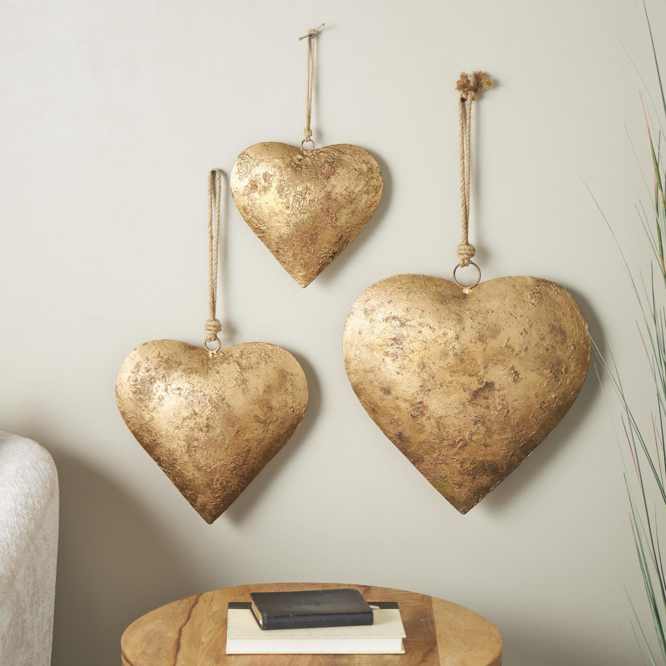 DecMode Tibetan Inspired Gold Metal Heart Decorative Bells with Jute Hanging Rope, 3 Count