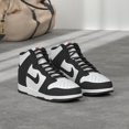 thumbnail image 2 of Zapato Nike WMNS Dunk High de piel blanco/negro para mujer, 2 of 9