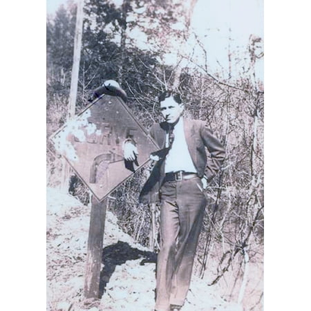 Clyde Barrow Dressed In A Suit And Standing With His Hand Place Through A Hold On A Road Sign (Best Place For Cheap Suits)