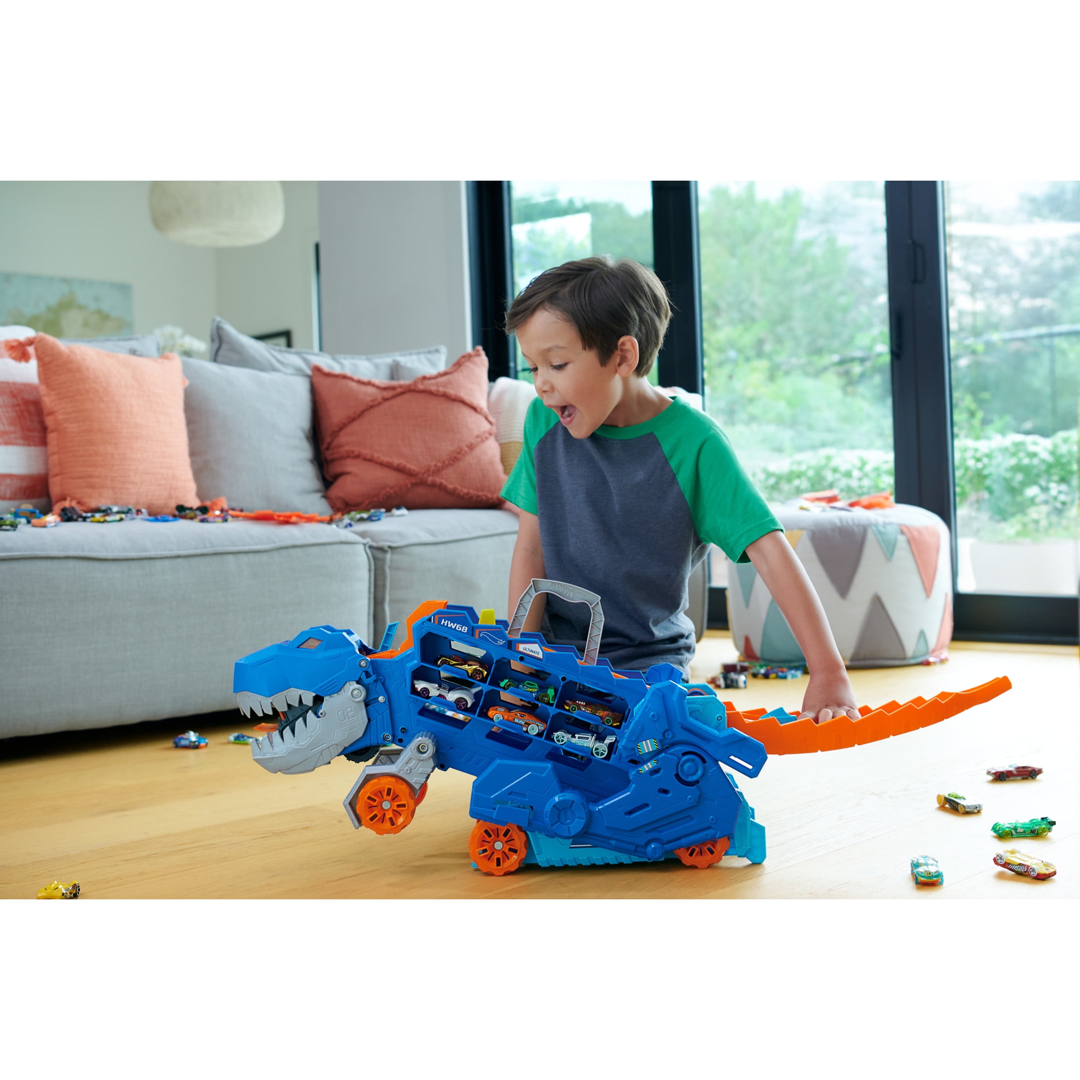 Hot Wheels City Ultimate T-Rex Transporter, Hauler Transforms into a Dino, Featured in “Let’s Race”