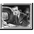 thumbnail image 2 of Historic Framed Print, [Walter Cronkite, half-length portrait, facing left, seated at desk with notes in hand and television monitor showing his image for The Morning Show"", 17-7/8" x 21-7/8", 2 of 9