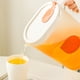 thumbnail image 4 of Jarra de agua de plástico con tapa | Jarra de bebida fría transparente para té helado, limonada, bebidas lácteas | Diseño de filtro de boquilla de boca ancha | Naranja | 22x15x11cm | 1 Pieza, 4 of 6