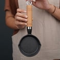 thumbnail image 5 of BIMZUC Cast Iron Frying Pan – 16x3 cm, Stain‑Resistant, Quick‑Heat, Oil‑Free Cooking, Easy‑Clean, Durable Skillet with Wooden Handle, 5 of 7