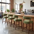 thumbnail image 4 of Dayalane Modern Counter Height Bar Stools Set of 4, 27" H Barrel Back Velvet Upholstered Counter Stools with Wood Legs, Barstools for Kitchen Island, Dining Room Bar, Green, 4 of 9
