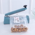 thumbnail image 3 of La máquina de sellado a presión manual con forma de libélula verde puede sellar bolsas de dulces, pasteles de luna, té, turrón y otras bolsas de embalaje, máquina de sellado de plástico, 3 of 3