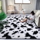 thumbnail image 2 of Alfombra DweIke 152x244 cm de Peluche Suave Estampado de Vaca en Blanco y Negro, 2 of 9