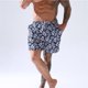 thumbnail image 1 of Pantalones de playa transpirables de secado rápido para hombre, pantalones cortos holgados informales de cinco puntos de talla grande, pantalones grandes estampados Pompotops  qyievc7154, 1 of 9