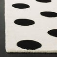 thumbnail image 3 of Safavieh Kids Collection SFK904D Handmade Polka Dot Wool Area Rug, 4' x 6', Ivory / Black, 3 of 4